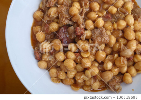 pig tryp dish as typical spanish tapas food with chickpeas pig tryp dish as typical spanish tapas food with chickpeas 130519693