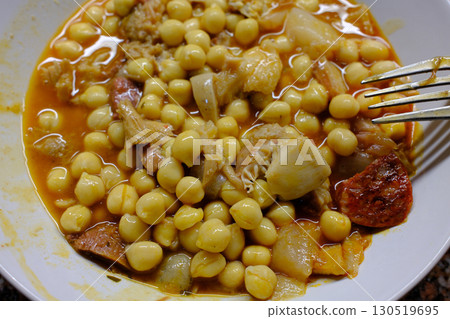 pig tryp dish as typical spanish tapas food with chickpeas pig tryp dish as typical spanish tapas food with chickpeas 130519695