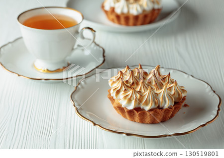 Meringue tart on a white table. 130519801