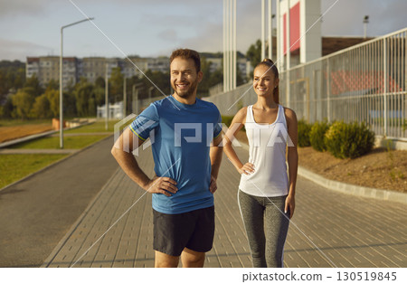 Happy Sport Team Of Man And Woman Training Outdoors In City Park 130519845