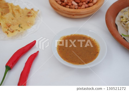 Crispy Peanut Rempeyek with Chili and Peanut Sauce Crispy Peanut Rempeyek with Chili and Peanut Sauce 130521272
