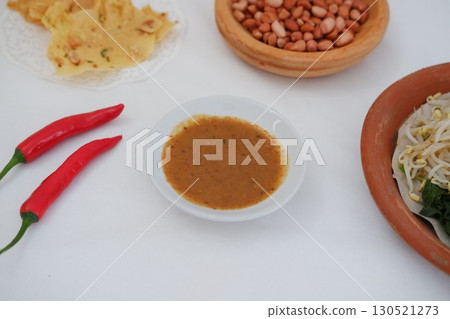 Crispy Peanut Rempeyek with Chili and Peanut Sauce Crispy Peanut Rempeyek with Chili and Peanut Sauce 130521273