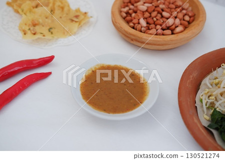 Crispy Peanut Rempeyek with Chili and Peanut Sauce Crispy Peanut Rempeyek with Chili and Peanut Sauce 130521274