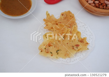 Crispy Peanut Rempeyek with Chili and Peanut Sauce 130521279