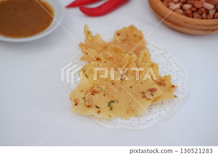 Crispy Peanut Rempeyek with Chili and Peanut Sauce Crispy Peanut Rempeyek with Chili and Peanut Sauce 130521283