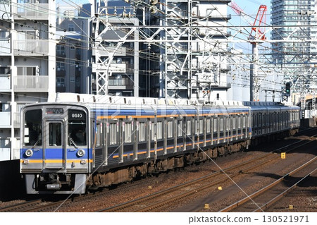 Nankai Electric Railway 9000 series train heading towards Namba on the Nankai Main Line 130521971