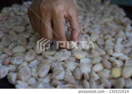 Picking Up Fresh Cocoa Beans With Your Hand Picking Up Fresh Cocoa Beans With Your Hand 130522014