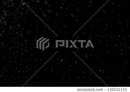 Water drops on glass on a black background. Water drops on glass on a black background. 130522155