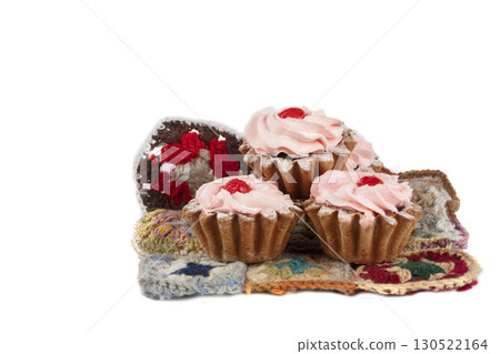 Beautiful sweets. Cakes basket with pink cream decorated with red berries. 130522164