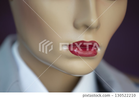 Manikin woman face with red lips close up. Manikin woman face with red lips close up. 130522210