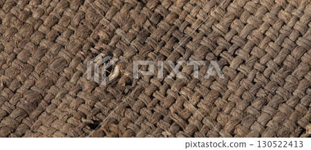 Burlap close-up. Rough canvas. Rough weave fabric background. 130522413