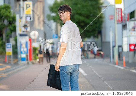 A man walking in the city 130523046
