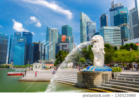 Singapore: Merlion statue and skyscrapers against the blue sky 130523060