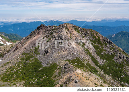 View of Mt. Kengamine from Mt. Hakusan Gozenmine Climbing Mt. Hakusan Gozenmine in early summer View of Mt. Kengamine from Mt. Hakusan Gozenmine Climbing Mt. Hakusan Gozenmine in early summer 130523881
