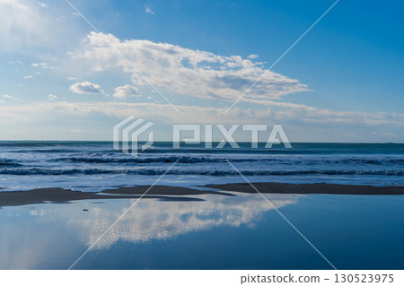 The blue sky reflected by the sea The blue sky reflected by the sea 130523975