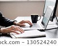 Businessman with laptop and virtual interface 130524240