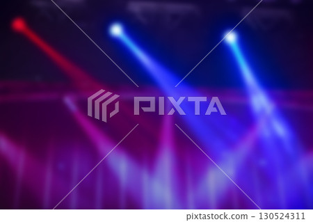 Blurry multicolored rays from the stage lighting. Blurry multicolored rays from the stage lighting. 130524311