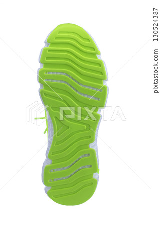 Sole of green sneaker on white background Sole of green sneaker on white background 130524387