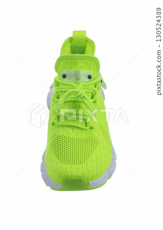 Green sneaker made of fabric on a white background Green sneaker made of fabric on a white background 130524389