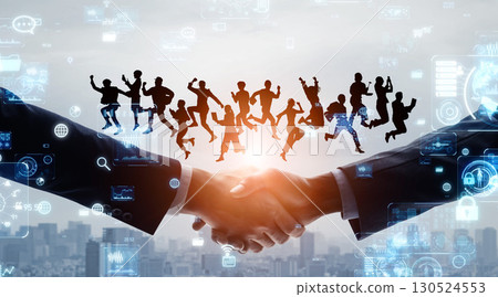 在城市和數位技術的背景下，一位商人與各種跳躍的人握手的輪廓 130524553
