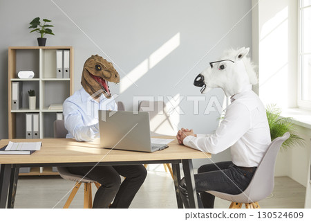 Strange people in funny animal masks having a business meeting or a job interview 130524609