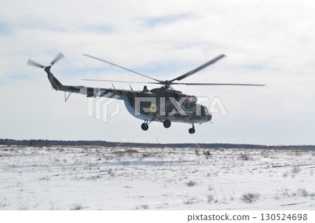 The Ukrainian helicopter landing on the snow ground The Ukrainian helicopter landing on the snow ground 130524698