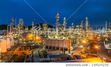 Aerial view oil and gas refinery plant at night, Global business energy logistic transportation, Oil and gas refinery petrochemical industrial, Petrochemical refinery industrial energy supply chain. 130525210