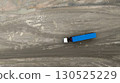 Aerial View semi truck on dirt road, Semi truck with  trailer on dirt road countryside, Top view of semi truck cargo driving on dirt road. 130525229