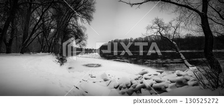 Winter Riverside Serenity: A Frosty Tale Along the Riverbanks 130525272