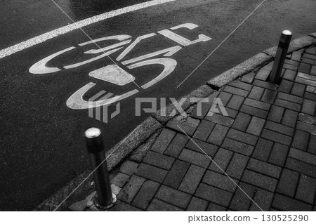 Urban Bicycle Lane in Rainy Weather Urban Bicycle Lane in Rainy Weather 130525290