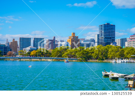 Bridge and boats in Ohori Park 130525539