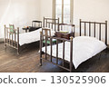 A retro Showa-era hospital room with wooden beds 130525906