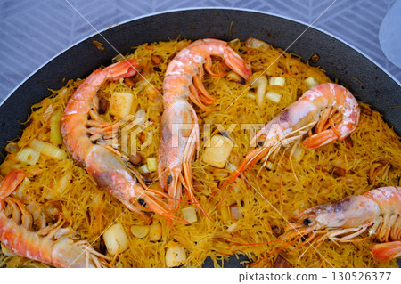 noodle fish dish as spanish food 130526377