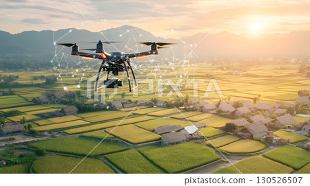 A drone flying above green rice fields during sunset, scanning crops with AI technology. Perfect for agriculture, smart farming, and tech applications. A drone flying above green rice fields during sunset, scanning crops with AI technology. Perfect for agriculture, smart farming, and tech applications. 130526507