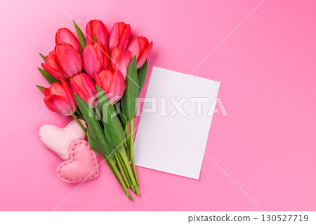Pink tulip bouquet with a handmade hearts and blank greeting card 130527719