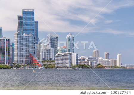 Modern skyline of Miami with towering skyscrapers, tropical vibe, and waterfront views 130527754