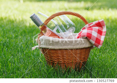Picnic basket with wine and glasses Picnic basket with wine and glasses 130527769