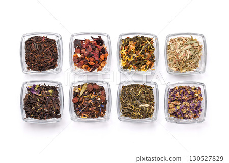 An assortment of various dry tea leaves, showcasing different textures, colors, and blends An assortment of various dry tea leaves, showcasing different textures, colors, and blends 130527829