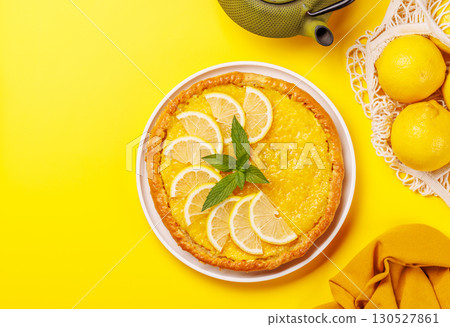 Delicious lemon tart with golden crust and smooth, glossy lemon filling Delicious lemon tart with golden crust and smooth, glossy lemon filling 130527861