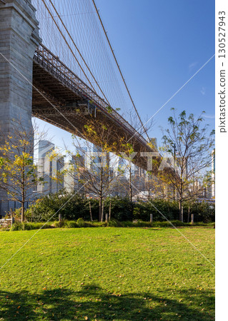 A panoramic view of the Brooklyn Bridge stretching towards Manhattan 130527943