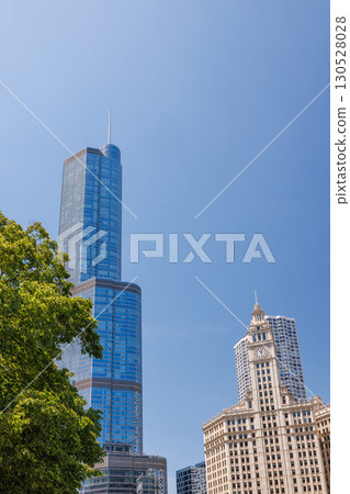 Vibrant sunny view of Chicago downtown skyline under a blue sky Vibrant sunny view of Chicago downtown skyline under a blue sky 130528028