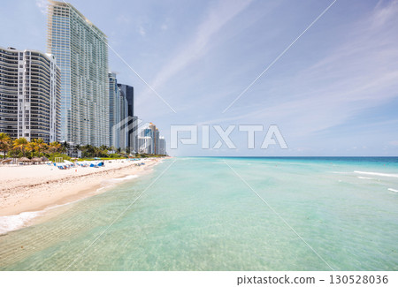 Modern skyline of Miami with towering skyscrapers, tropical vibe, and waterfront views 130528036