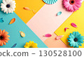 Gerberas and petals arranged on a colorful background 130528100