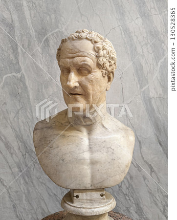 VATICAN CITY, ROME, ITALY - AUGUST 02, 2025 Classical marble bust of Aulus Postumius Albinus, a Roman politician and consul in the Chiaramonti museum 130528365