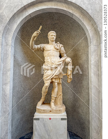 VATICAN CITY, ROME, ITALY - AUGUST 02, 2025 Classical marble sculpture of the Roman emperor Domitian in military attire located in the Chiaramonti Museum, Braccio Nuovo (New Wing) 130528373