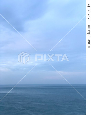 Calm seascape with soft blue sky and horizon. Calm seascape with soft blue sky and horizon. 130528416