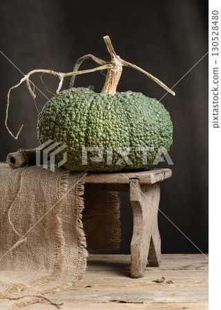 Heirloom Winter Squash Buen Gusto de Horno On Wooden Stool Heirloom Winter Squash Buen Gusto de Horno On Wooden Stool 130528480