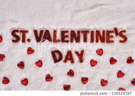 Festive St. Valentine's Day background on a white plush background with hearts. 130528787