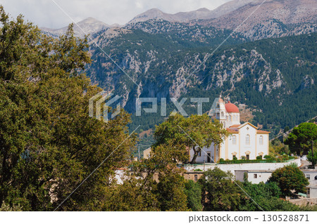 Church and chapel of Agios Mamas in Lakkoi village in Crete mountains on sunny day. 130528871