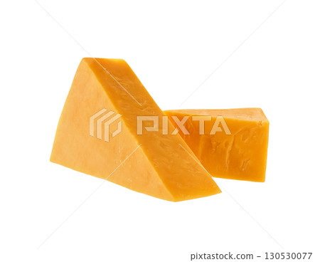 piece of cheddar cheese isolated on a white background. 130530077